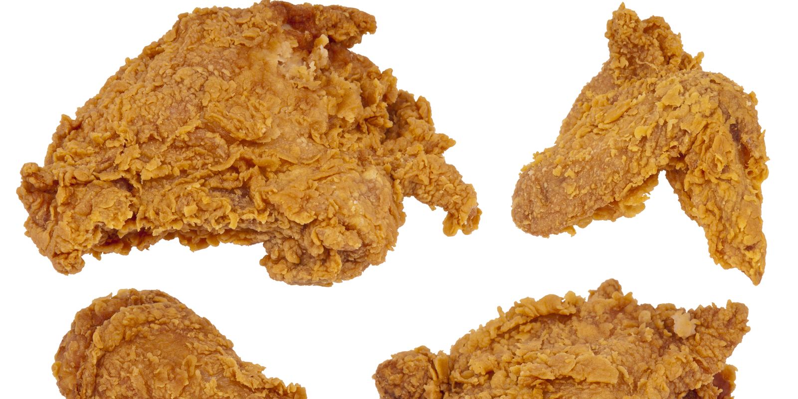 A plate of golden fried chicken pieces with sides